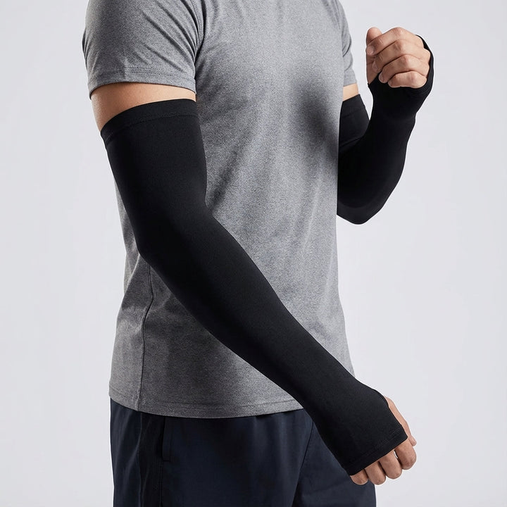 Pair of athletic cooling arm sleeves in white, ideal for outdoor sports and UV protection.