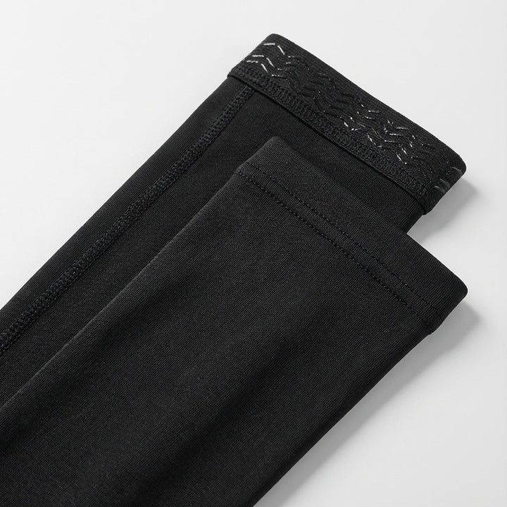 Close-up of a gray breathable sports arm sleeve, highlighting the fabric texture for comfort.
