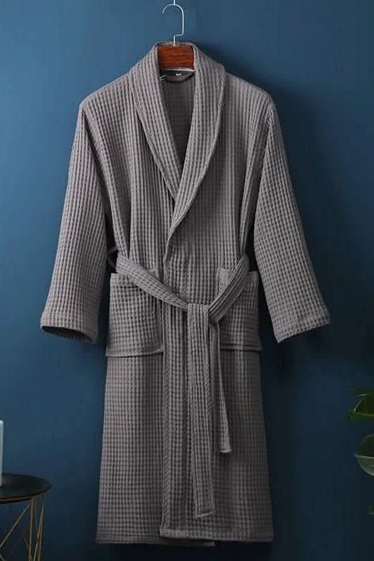 Premium unisex waffle bathrobe, a breathable loungewear essential for cozy home comfort & relaxation.