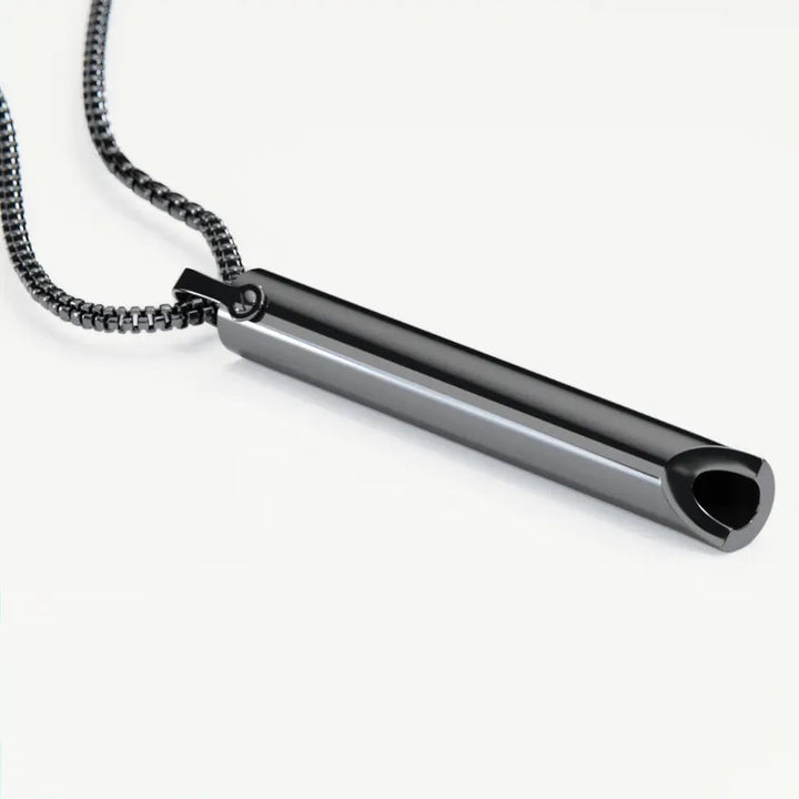 Sleek unisex breathing pendant, a meditation aid for mindful breathing & anxiety relief. Promotes calm.