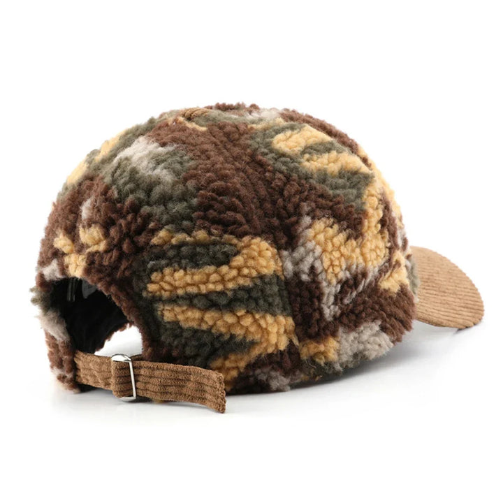 Brown camo plush hat, soft fleece cap with a trendy corduroy brim. Warm unisex winter accessory.