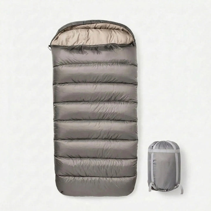 Durable camping sleeping bag with a spacious unisex design, perfect for comfortable outdoor recreation and travel gear.
