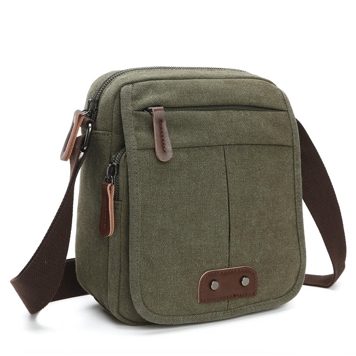 Unisex canvas crossbody bag with multiple pockets, perfect for everyday carry. Durable & versatile design.