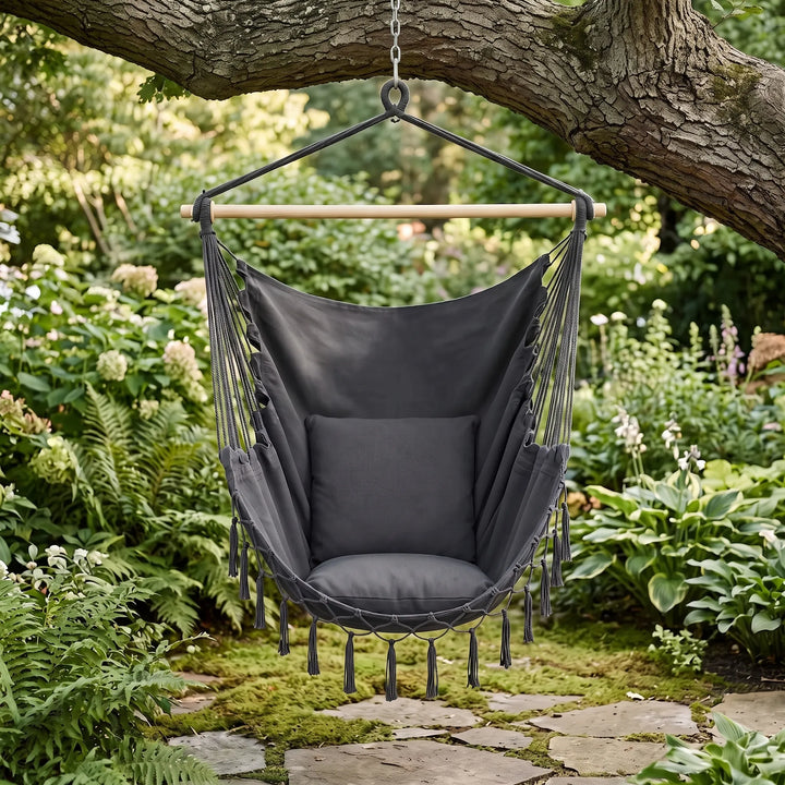 Unisex canvas hammock chair swing with soft cushions, perfect for indoor or outdoor relaxation. Boho style.