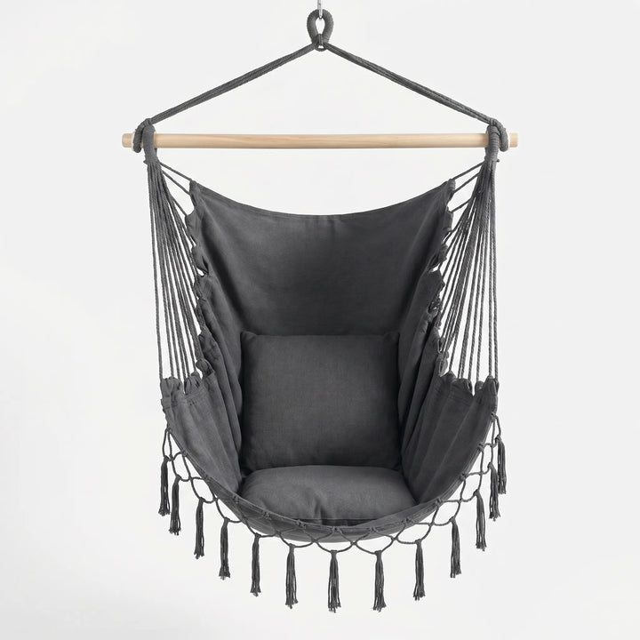 Cozy indoor swing chair with thick cushions, ideal for reading or relaxing. Space-saving hanging design.