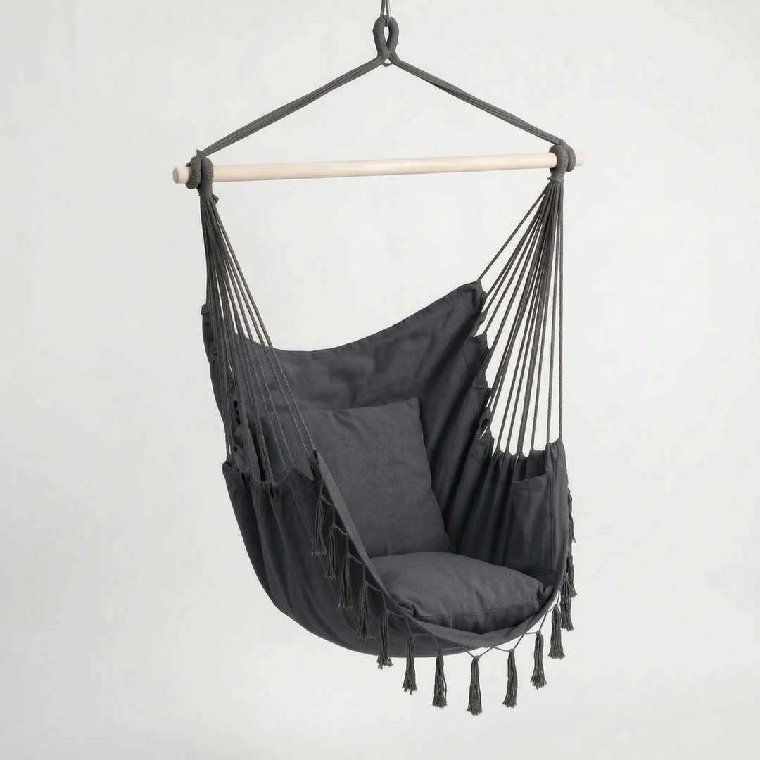 Boho hanging hammock swing chair with supportive cushions, a comfortable and chic indoor or outdoor seating option.