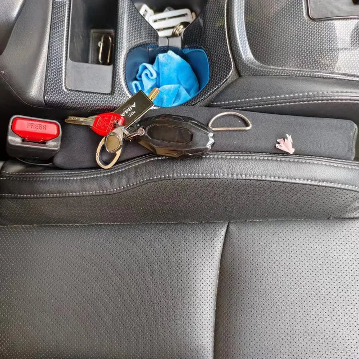 Set of two car seat gap fillers, designed as spill-proof strips to enhance vehicle storage and tidiness.