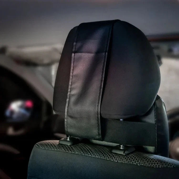 Soft beige headrest cushion, perfect for car travel, offering essential neck support & comfort.