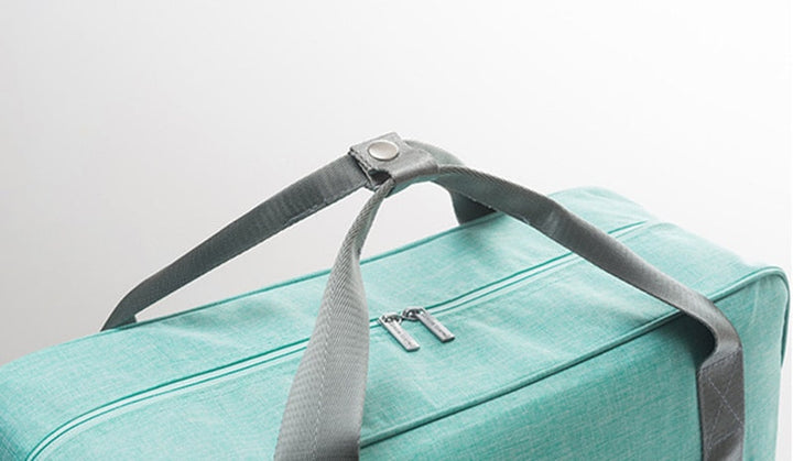 Multipurpose unisex carry-on travel bag, great as a weekend bag or extra luggage, attaching easily to suitcases.
