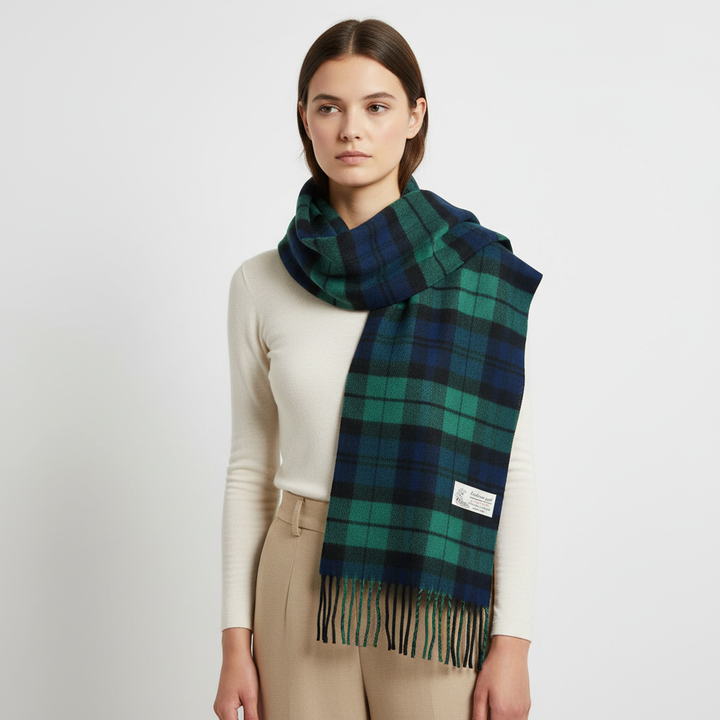 Unisex plaid scarf with a luxurious cashmere-feel, in a rich Stewart tartan, offering comfort and warmth in winter