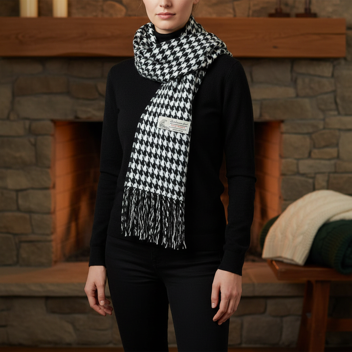 Close-up of a luxurious cashmere-feel plaid scarf, featuring a traditional Stewart tartan pattern, machine washable
