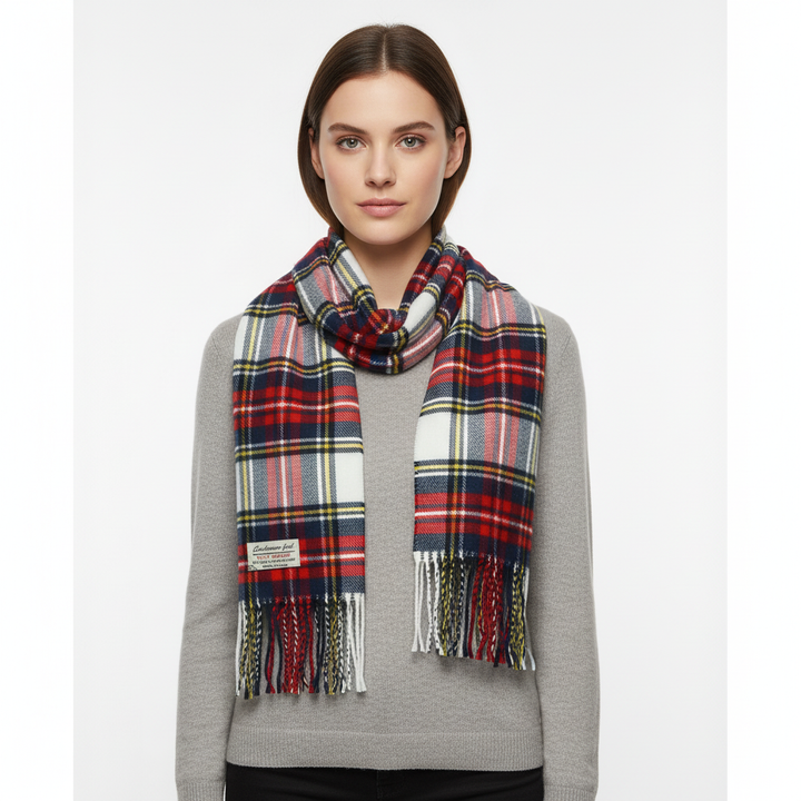 Detailed view of the weave on a cashmere-feel plaid scarf, highlighting the Stewart tartan design and soft texture
