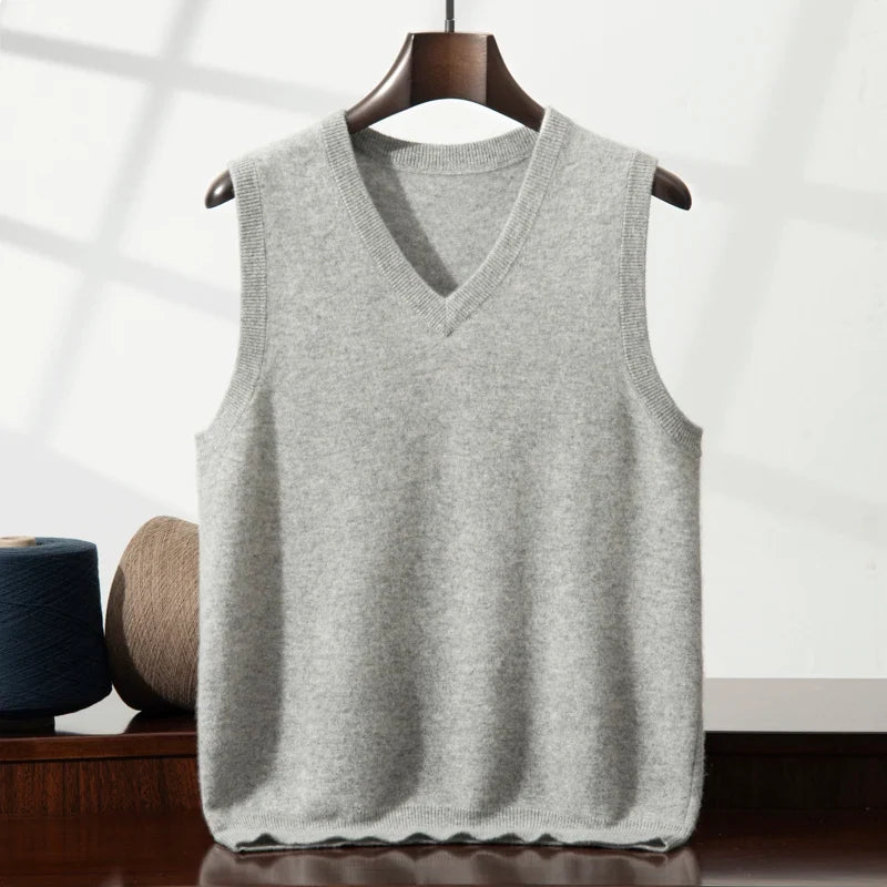 Luxury unisex cashmere sweater vest with V-neck. Soft & warm layering piece.
