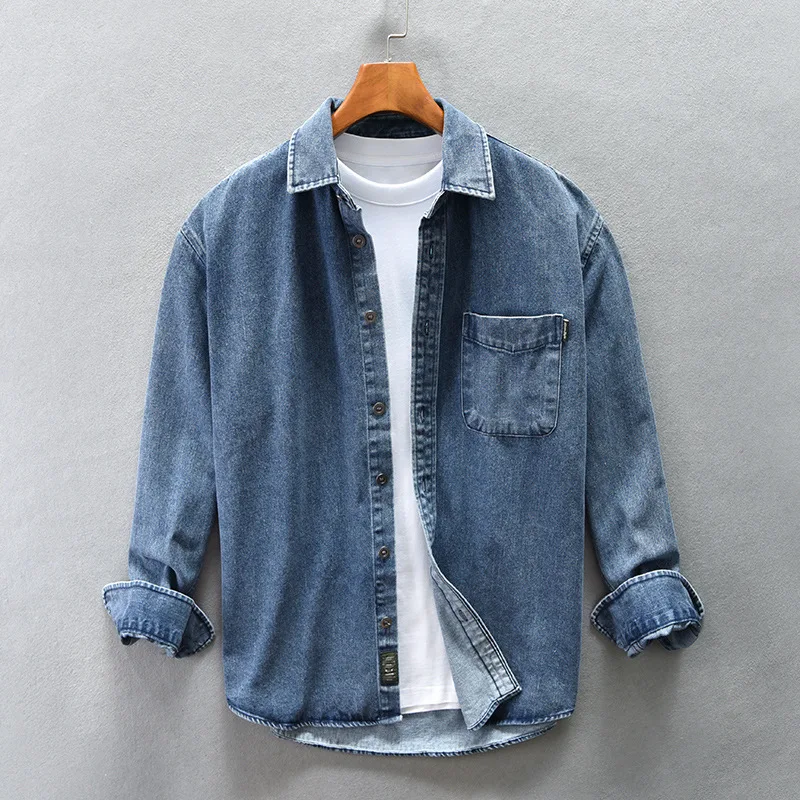 Unisex casual button-up shirt in a relaxed fit, perfect for everyday wear and versatile styling.