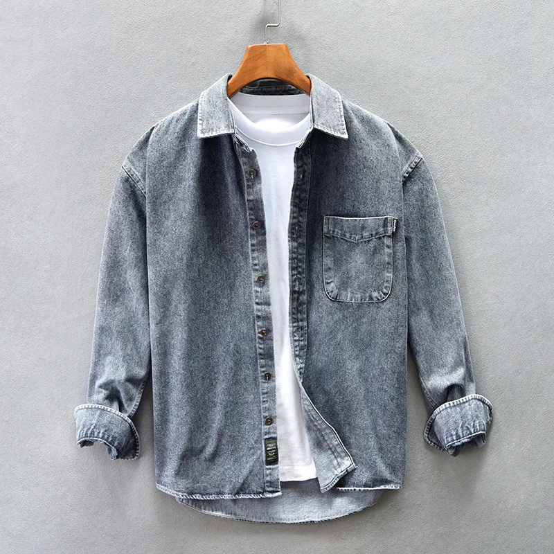 Blue long sleeve button-up shirt for men and women, featuring a collared design and single chest pocket.