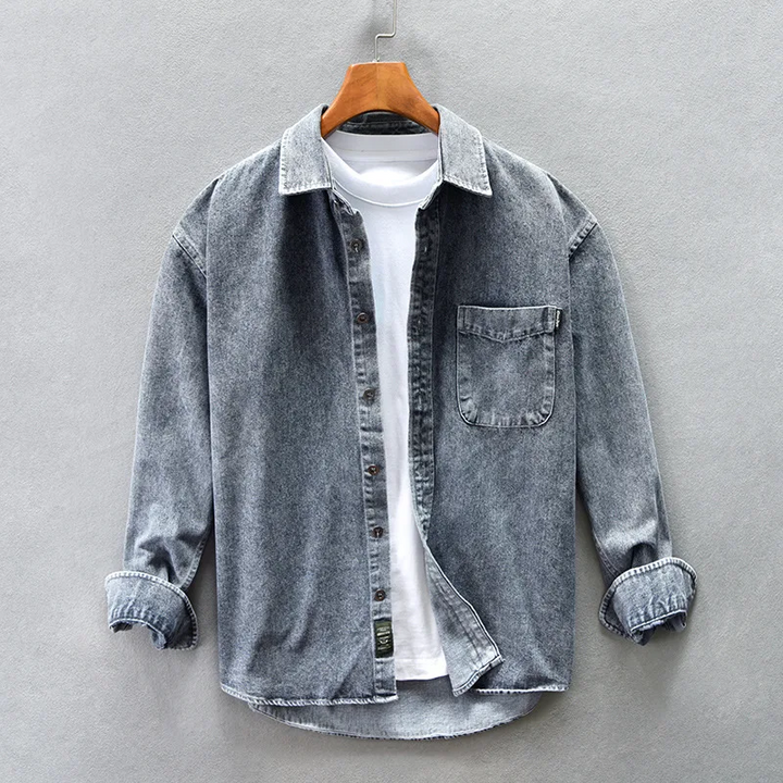 Blue long sleeve button-up shirt for men and women, featuring a collared design and single chest pocket.
