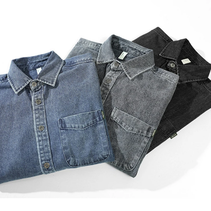 Casual blue button-up shirt with a relaxed fit, featuring a practical pocket, suitable for diverse casual outfits.