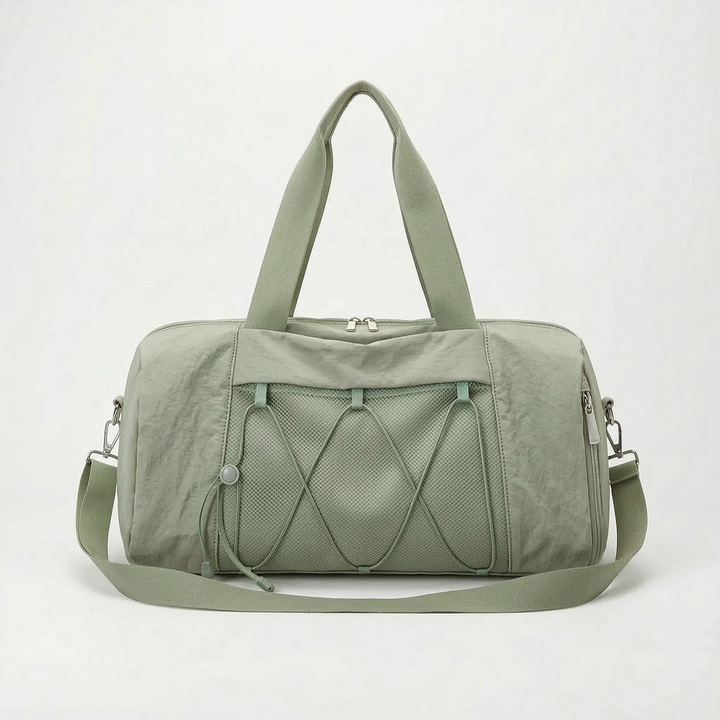 Versatile unisex weekender bag: a casual gym duffel with separate compartments for shoes, wet gear, & athletic essentials.
