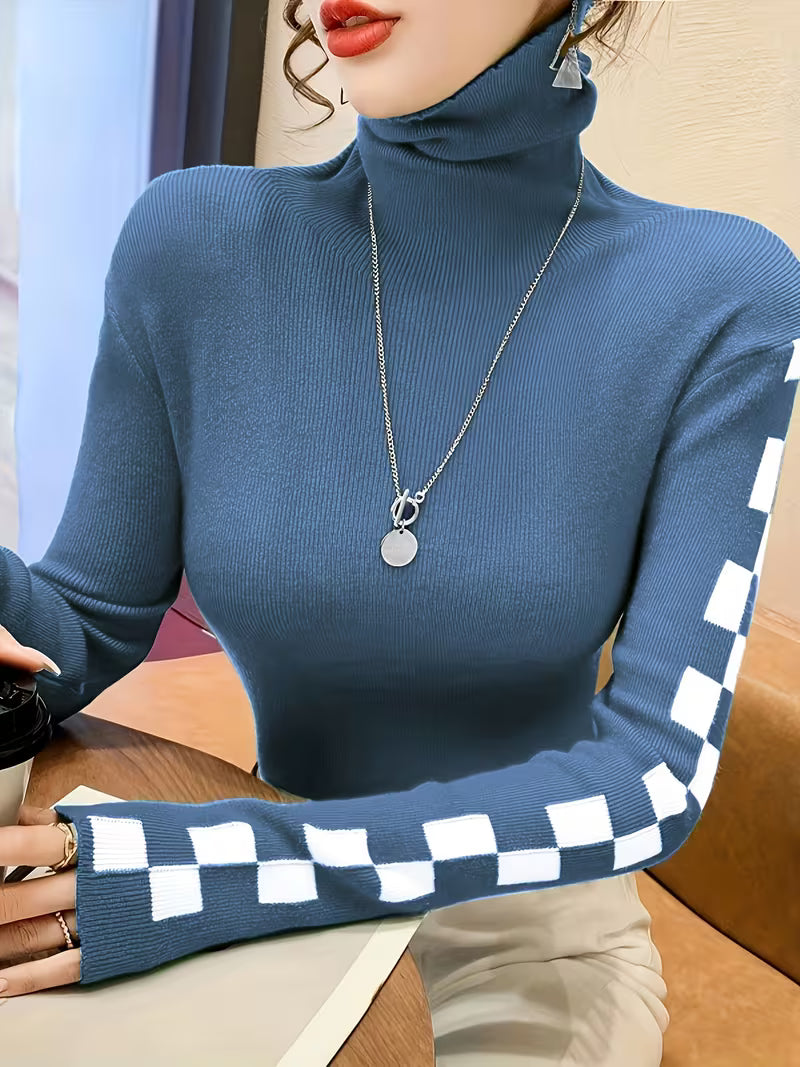 Comfortable unisex high-neck sweater with unique checkerboard sleeves. Perfect for layering.