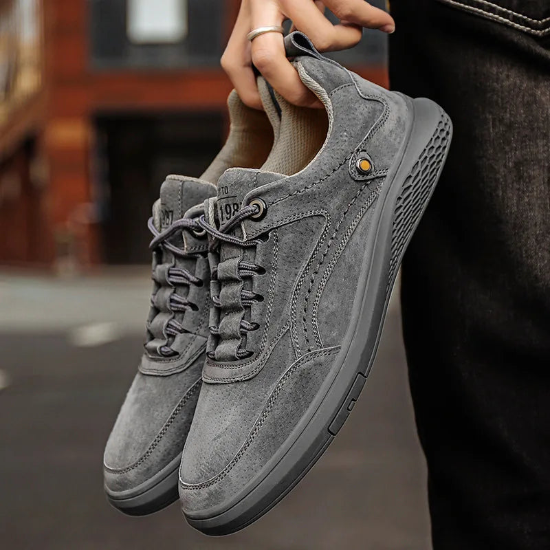 Unisex classic grey suede sneakers, perfect for everyday comfort & casual style.