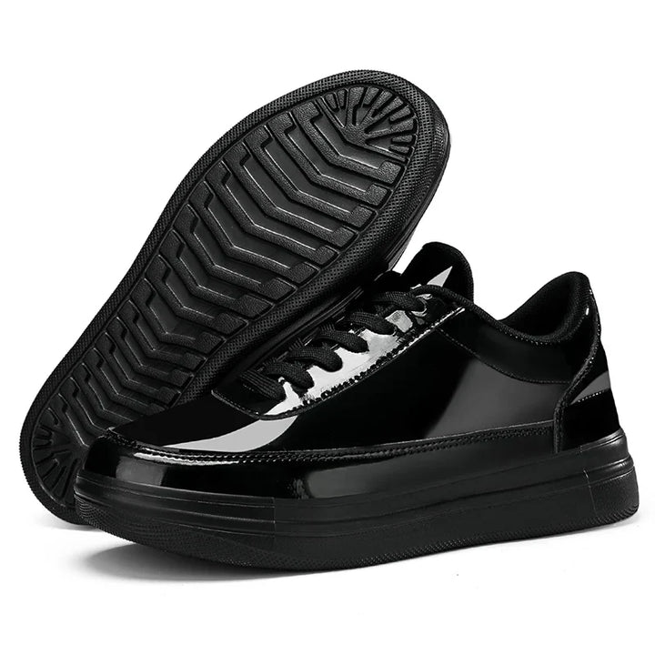Top-down view of glossy Classic Legacy unisex sneakers, highlighting premium materials & comfort.