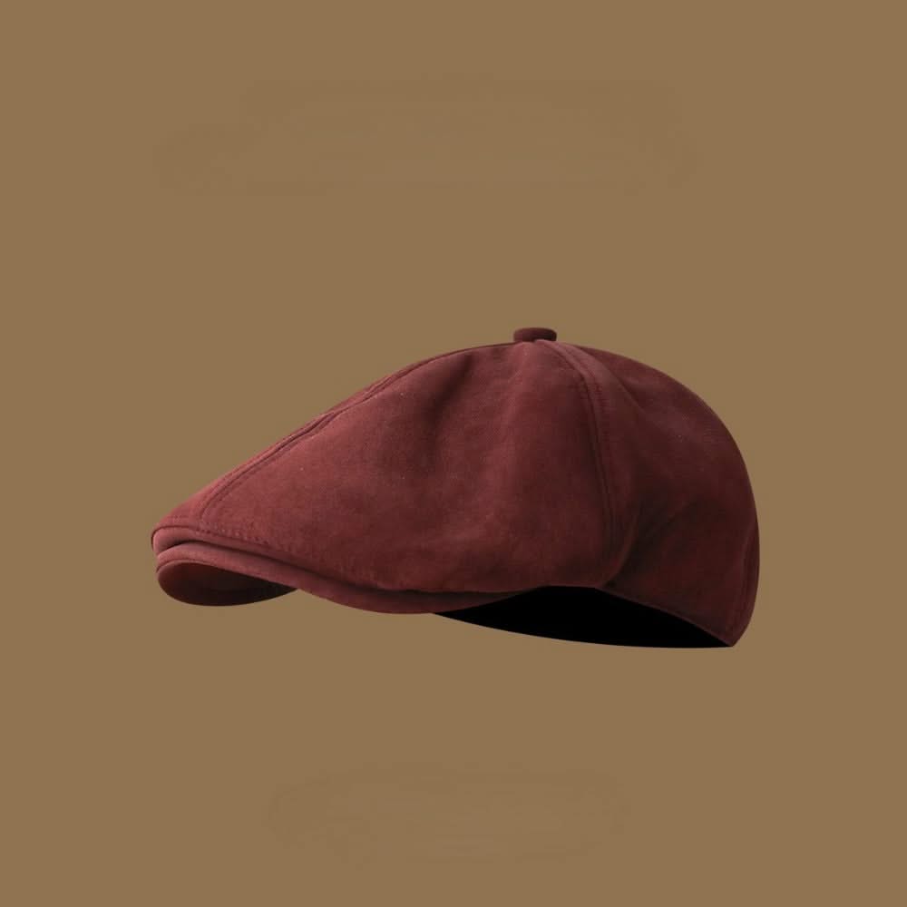 Burgundy adjustable newsboy cap for unisex fashion, ideal for fall headwear.