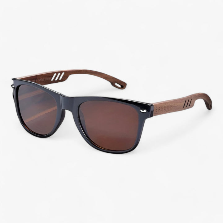 Black unisex classic sunglasses offering full UV protection & anti-glare for stylish eye protection this summer.