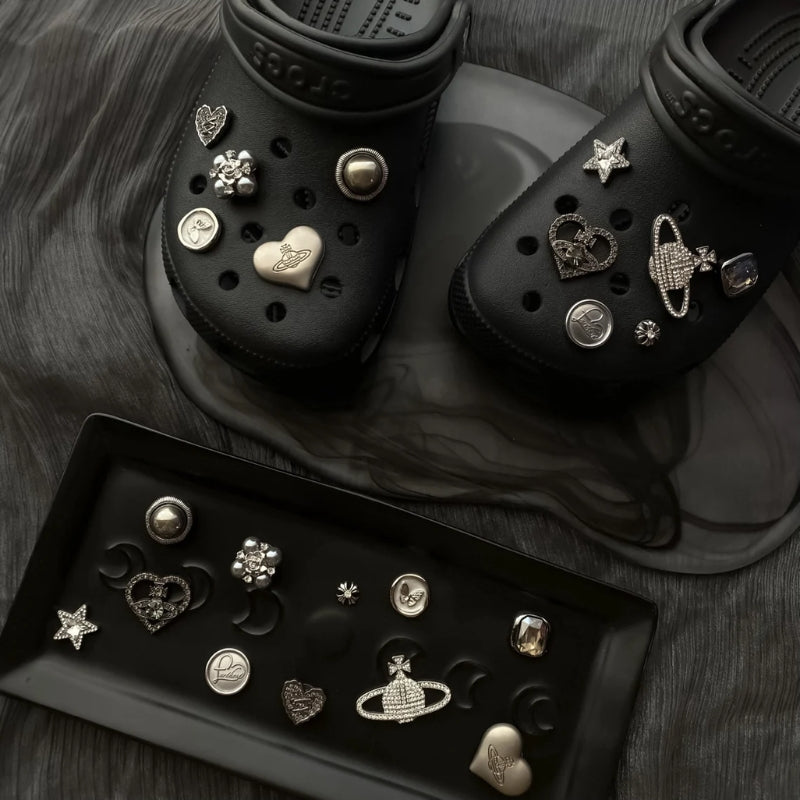 Unisex clog shoe charms set with diverse designs for custom footwear decoration.