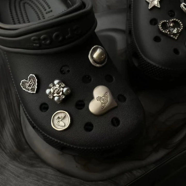 Modern style metal accent clog charms for unisex footwear, enhancing any pair of shoes.