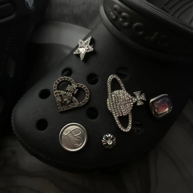 Enhance your clogs with a stylish unisex set of shoe accessories and decorative charms.