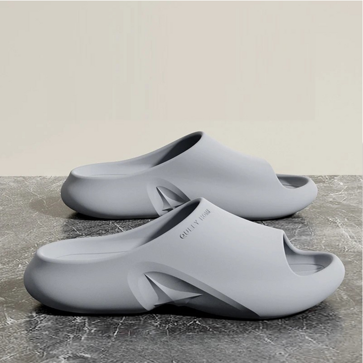 Modern unisex EVA slides with cloud-like comfort. Lightweight, breathable design perfect for summer casual wear.
