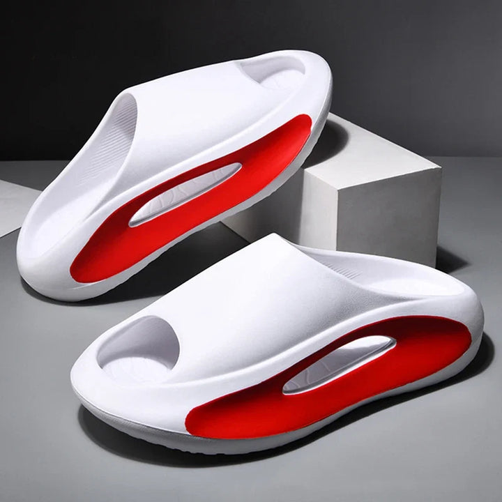 Cushioned Cloud Comfort foam slides, ideal recovery footwear for tired feet after sport or long days.