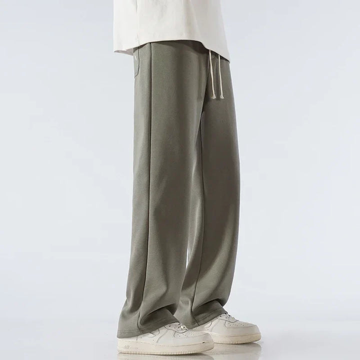 Stylish unisex wide-leg sweatpants. Cloud Comfort for everyday wear, relaxed fit & adjustable waist.