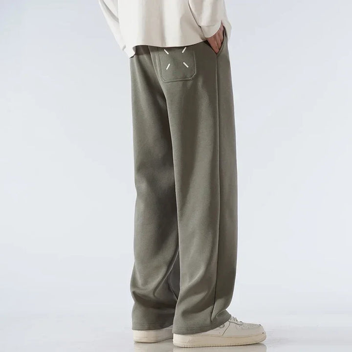 Premium Cloud Comfort wide-leg unisex sweatpants. Adjustable waist, relaxed fit for ultimate everyday style.