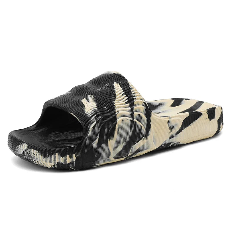 Stylish marbled Rio slides, unisex design with cloud-soft cushioning for all-day comfort.