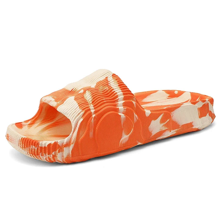 Marbled, cushioned unisex slides, made for ultimate comfort and lightweight summer footwear.
