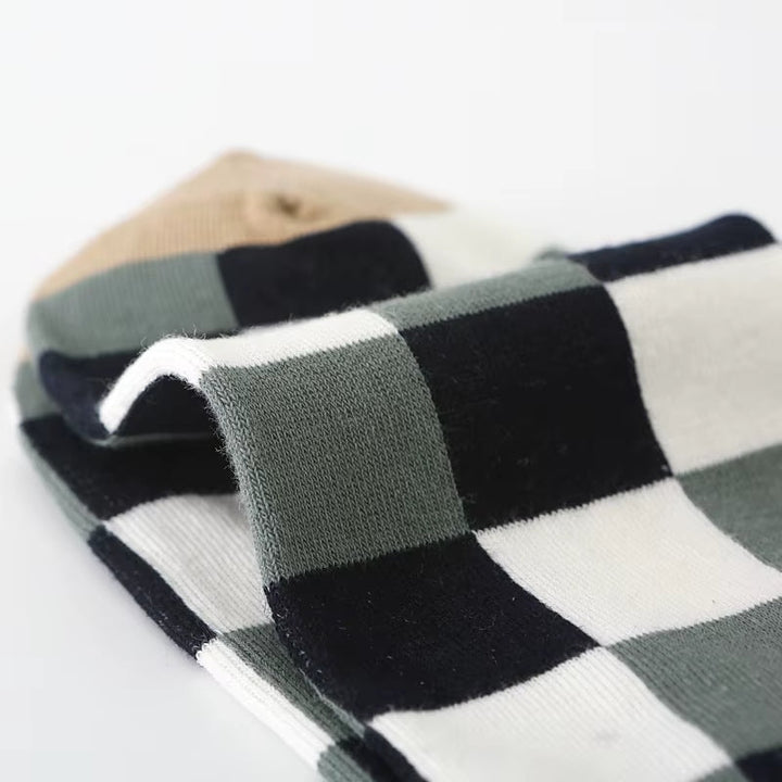 Vibrant unisex patchwork socks, inspired by color theory. Retro cotton blend for comfortable fashion accessories.