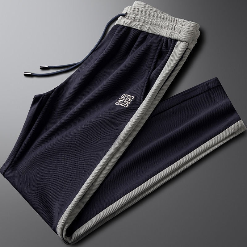 Two-tone unisex comfort drawstring pants. Relaxed fit lounge joggers, ideal for casual fashion & everyday style.
