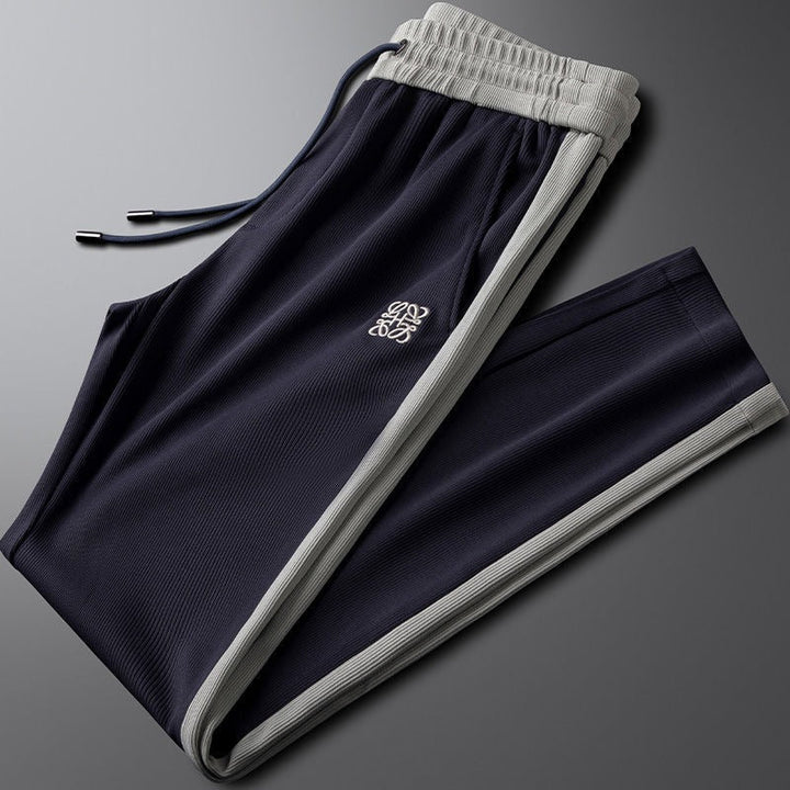 Two-tone unisex comfort drawstring pants. Relaxed fit lounge joggers, ideal for casual fashion & everyday style.