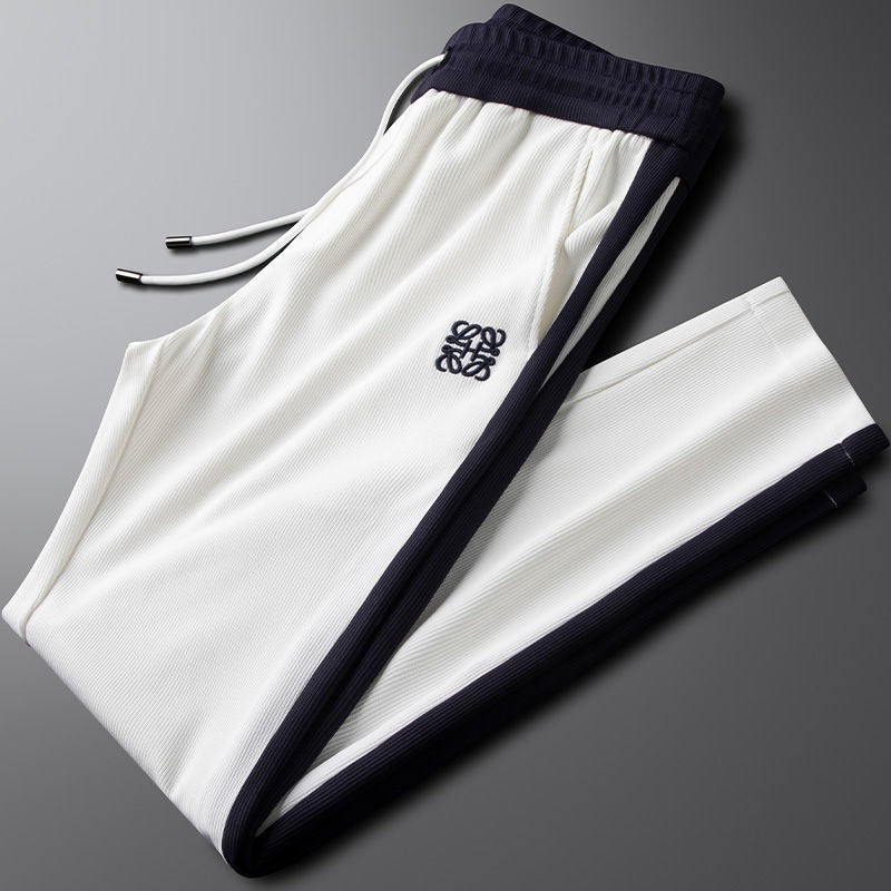 Relaxed fit unisex drawstring joggers. Ultra-comfortable lounge pants for versatile casual fashion & everyday wear.