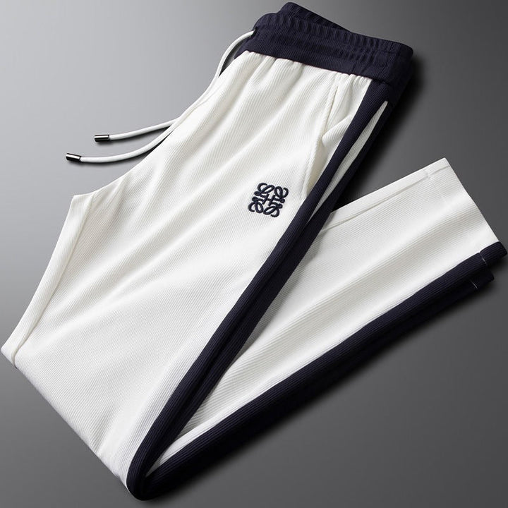 Relaxed fit unisex drawstring joggers. Ultra-comfortable lounge pants for versatile casual fashion & everyday wear.