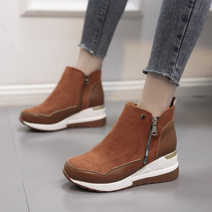 Side profile of stylish unisex mid-top sneakers, showcasing orthopedic design and cushioned comfort for daily wear.