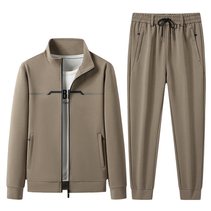 Unisex comfort tracksuit set in sleek black, featuring a soft, textured fabric, perfect for athleisure & casual wear.