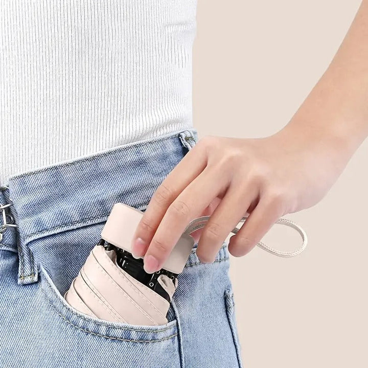 Small, lightweight travel umbrella. Compact design for easy portability & convenient daily use.