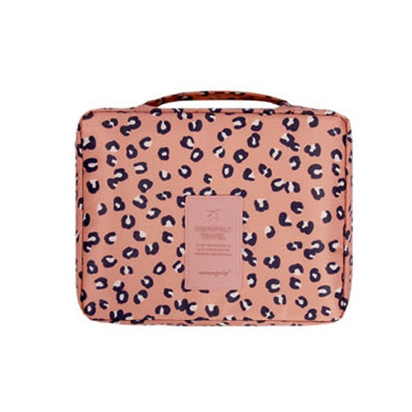 Waterproof travel organizer for makeup, compact and unisex, includes a free mini case.