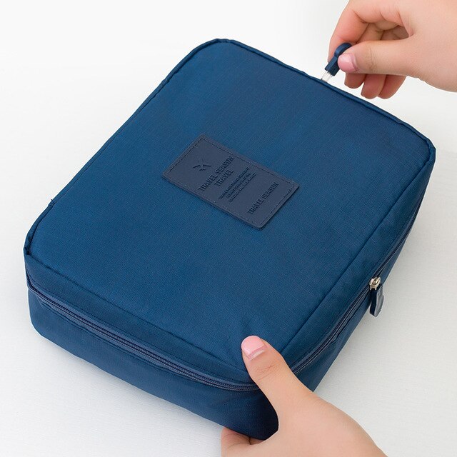 Portable compact waterproof makeup organizer, ideal for beauty accessories on the go.