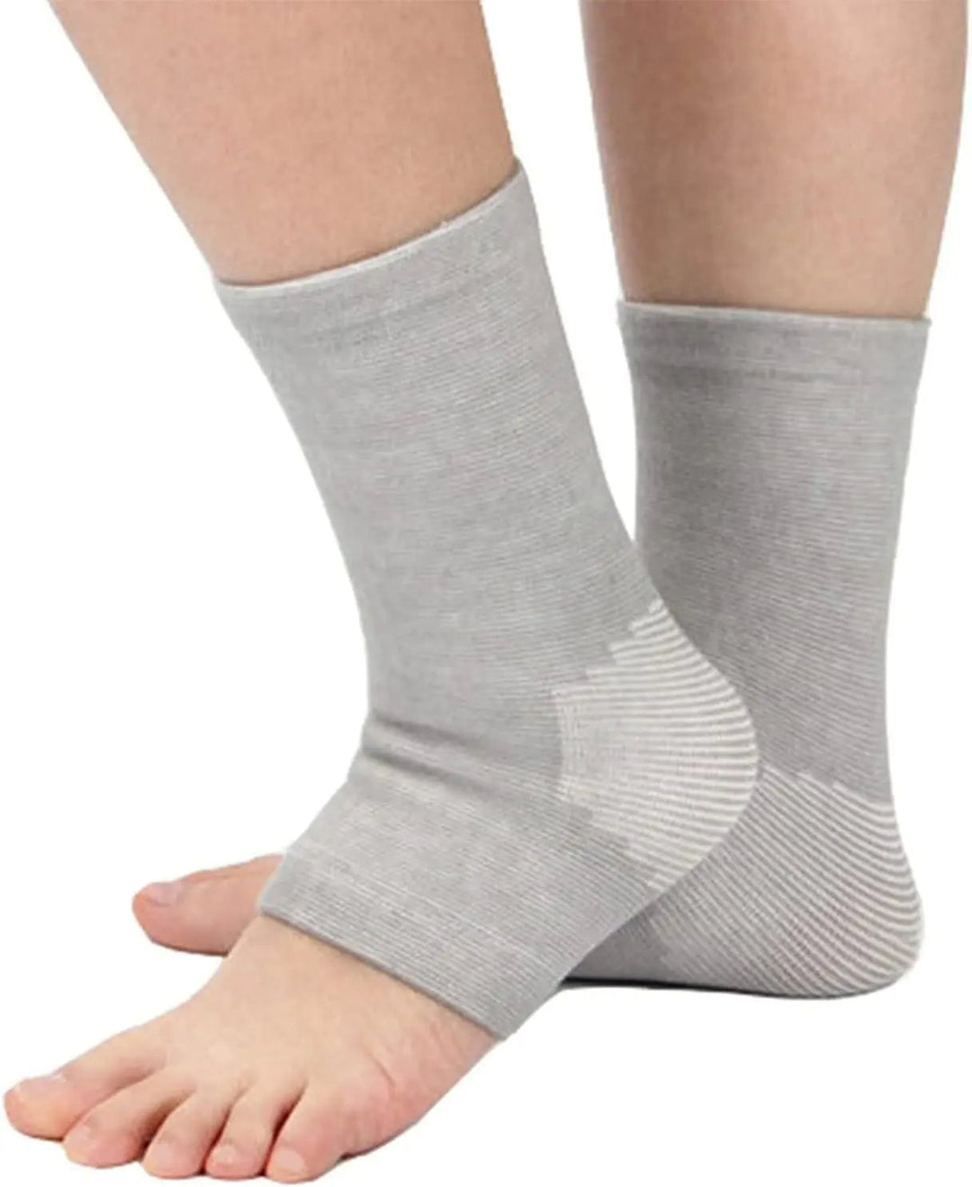 Unisex compression foot sleeves offer arch & ankle support for pain relief, improved circulation & recovery.