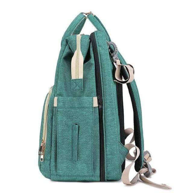 Unisex diaper bag showing its ergonomic shoulder straps and secure zipper closures