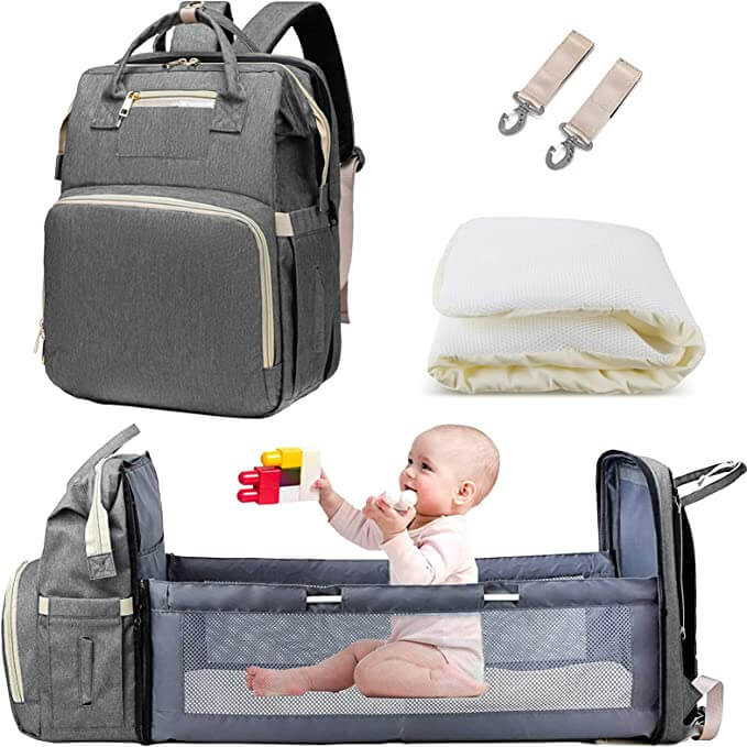 Detailed view of the bassinet's soft interior and breathable mesh sides for baby comfort