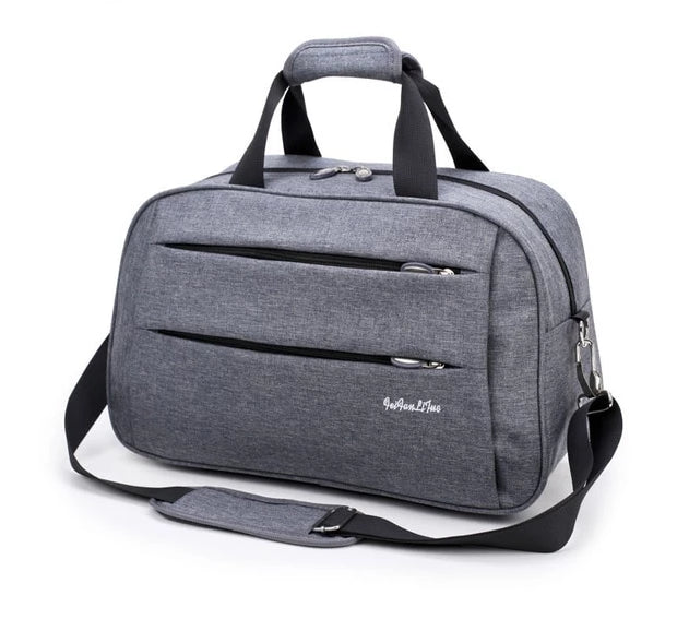 Black travel duffel bag, compact design suitable for carry-on restrictions, unisex